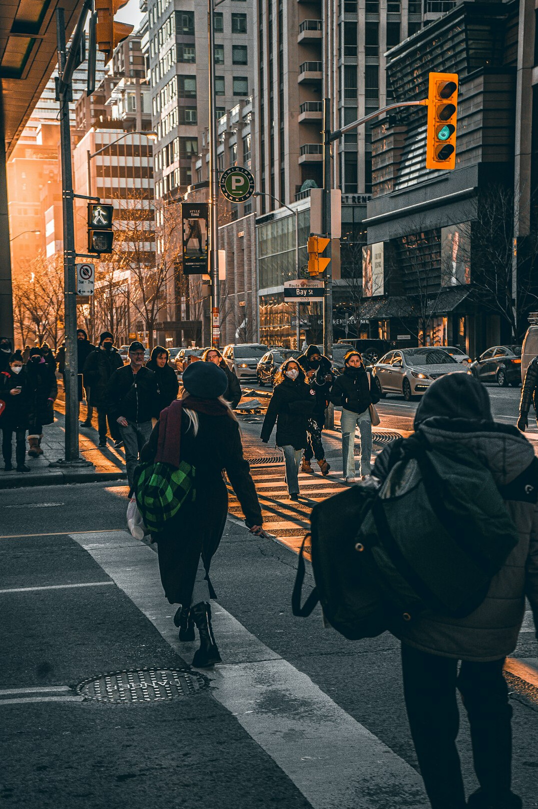 evening city street with commuters